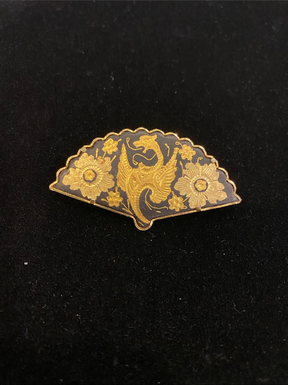 Vintage black and gold dragon brooch